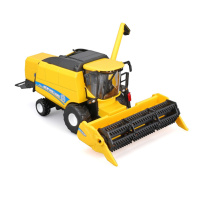 Автомодель Зернозбиральний комбайн "New Holland TC5.90" Bburago 18-31721 із зерновою жниваркою